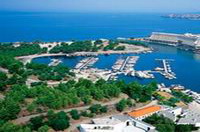 Отель PORTO CARRAS VILLAGE INN(3*+), фотография 01; Вид на отель